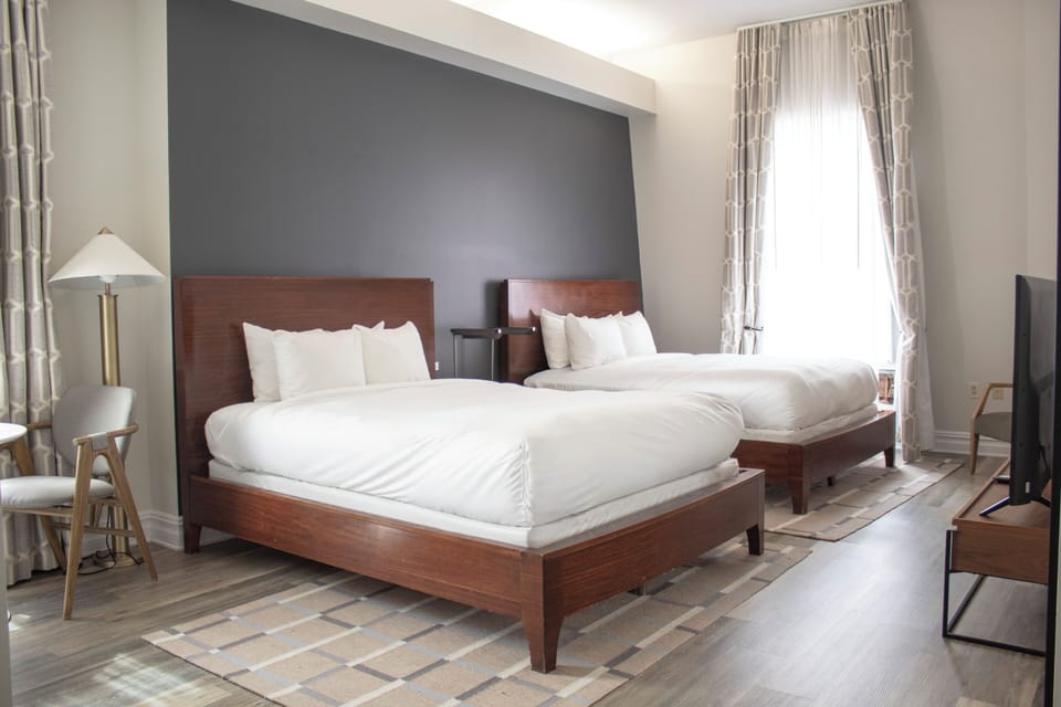 Room, 2 Queen Beds | Desk, cribs (free), WiFi (free), bed sheets