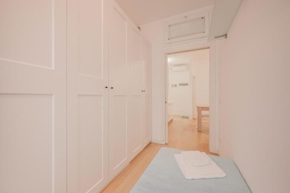 Standard Apartment, Courtyard View | Living area | Flat-screen TV
