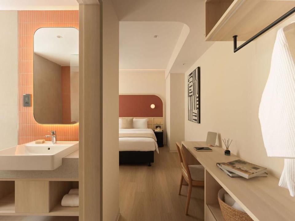 Deluxe Double Room, Courtyard View | In-room safe, desk, laptop workspace, blackout drapes