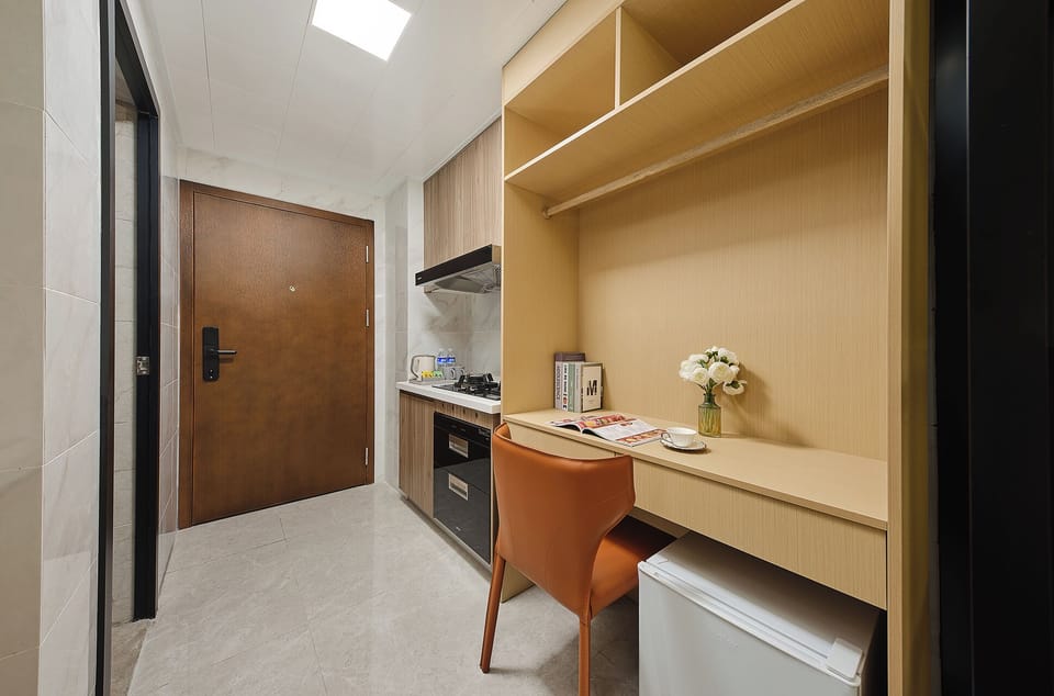 Luxury Suite, Non Smoking, City View | Living area | 65-inch TV with cable channels
