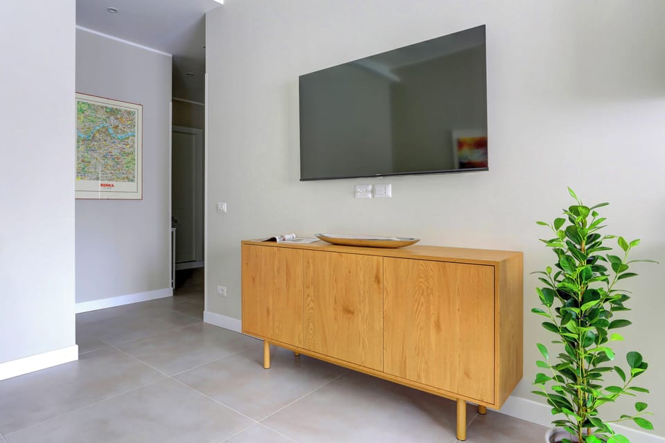Comfort Apartment | Living area | 40-inch Smart TV with digital channels