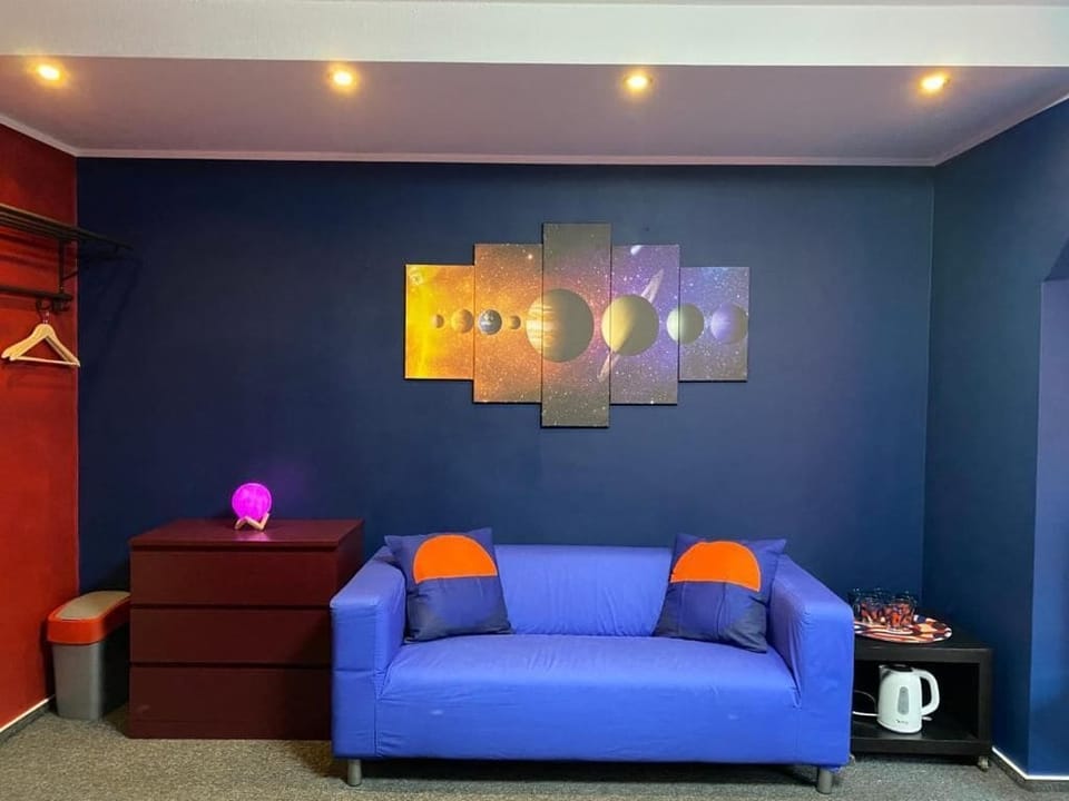 Comfort Triple Room, Multiple Beds | Living area