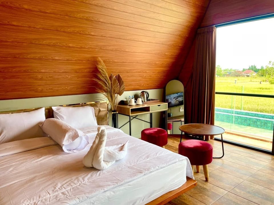 Deluxe Room, Patio, Pool View | Individually furnished, desk, laptop workspace, free WiFi