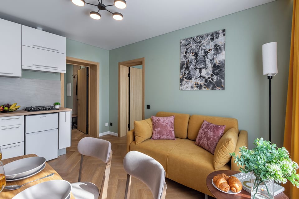 Superior Apartment, City View | Living area | 40-inch TV with cable channels
