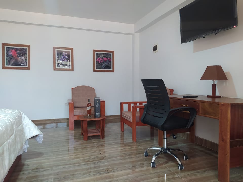 Desk, blackout drapes, iron/ironing board, WiFi (free)