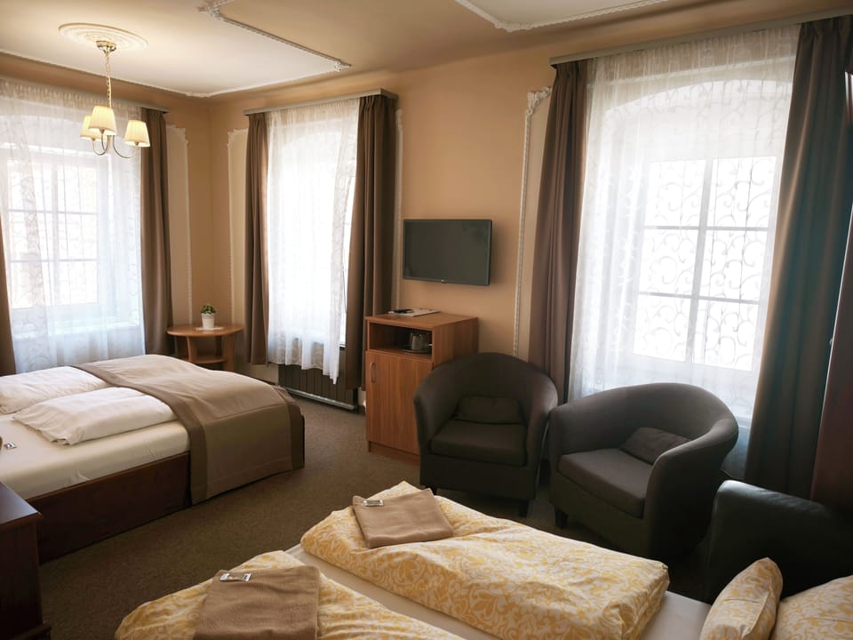 Deluxe Quadruple Room, City View | In-room safe, blackout drapes, cribs (surcharge), WiFi (free)