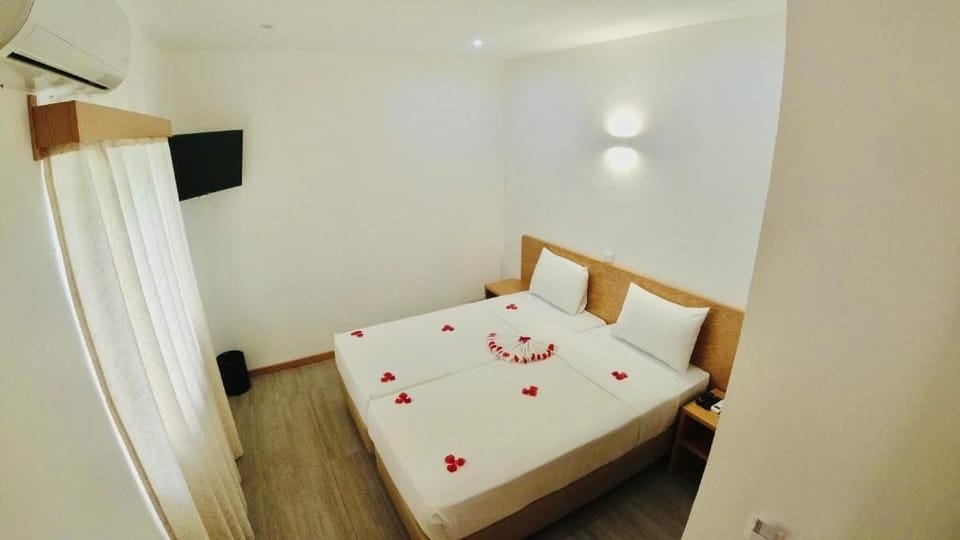 Iron/ironing board (on request), WiFi (free)
