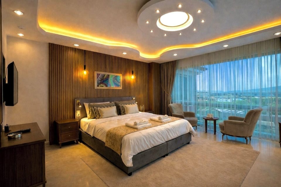 Junior Suite, City View | Premium bedding, down comforters, free minibar, individually decorated