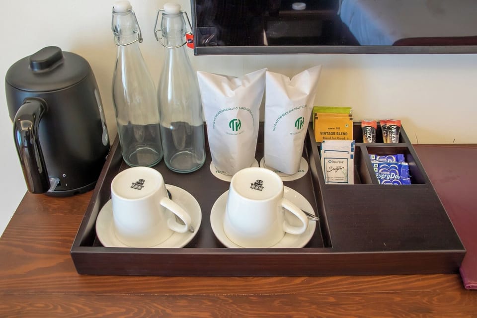 Executive Suite, River View | Coffee and/or coffee maker