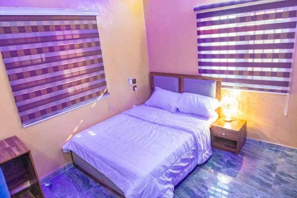 Family Apartment, Balcony, City View | In-room safe, desk, laptop workspace, blackout drapes