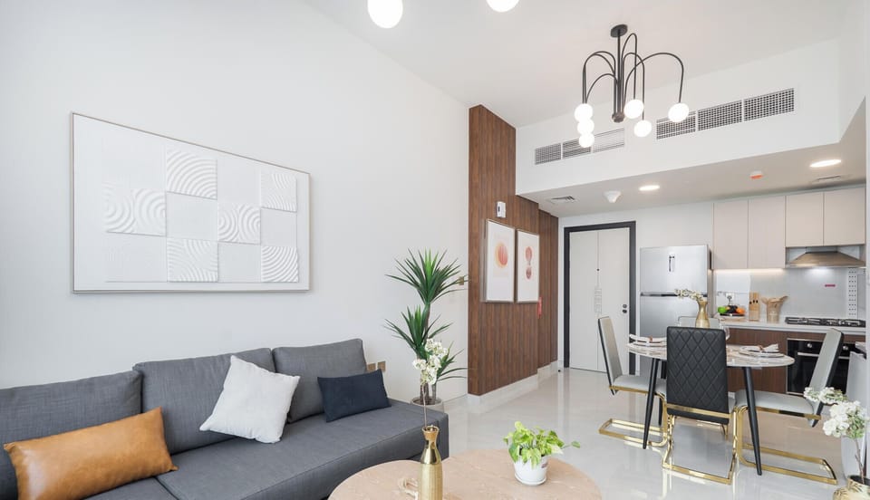 Deluxe Apartment | Living area | 65-inch Smart TV with cable channels
