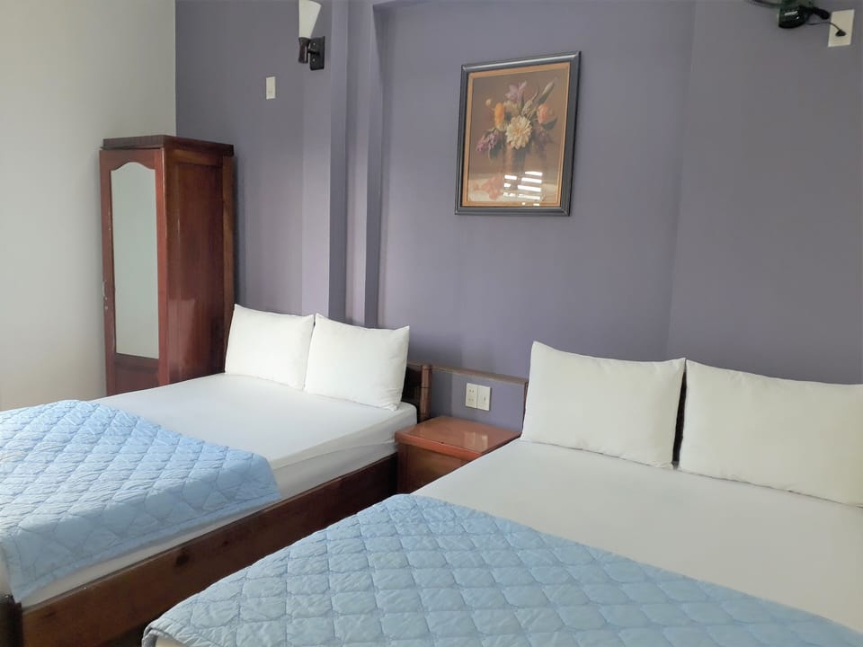 Superior Quadruple Room, City View | Premium bedding, in-room safe, desk, blackout drapes
