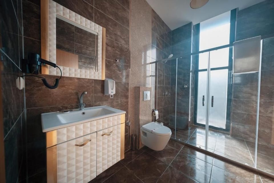 Hair dryer, towels, soap, shampoo