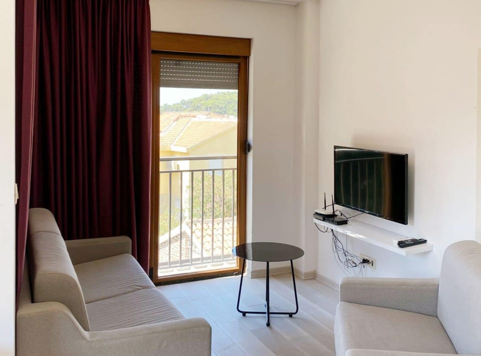 Apartment (One bedroom apartment near beach) | Living room