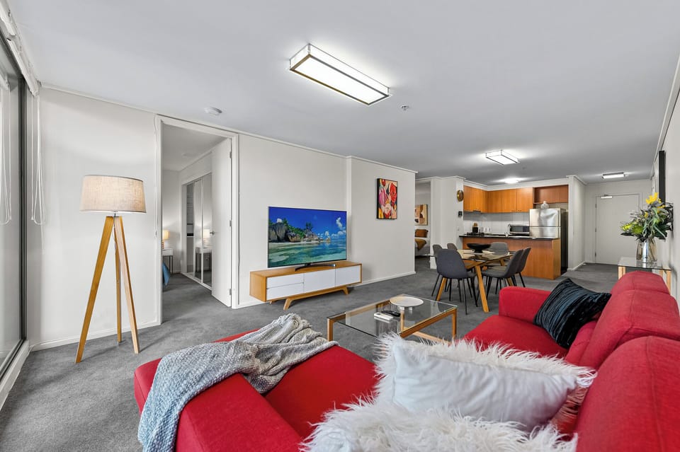 Standard Apartment, 3 Bedrooms, Balcony | Living area | 50-inch Smart TV with digital channels