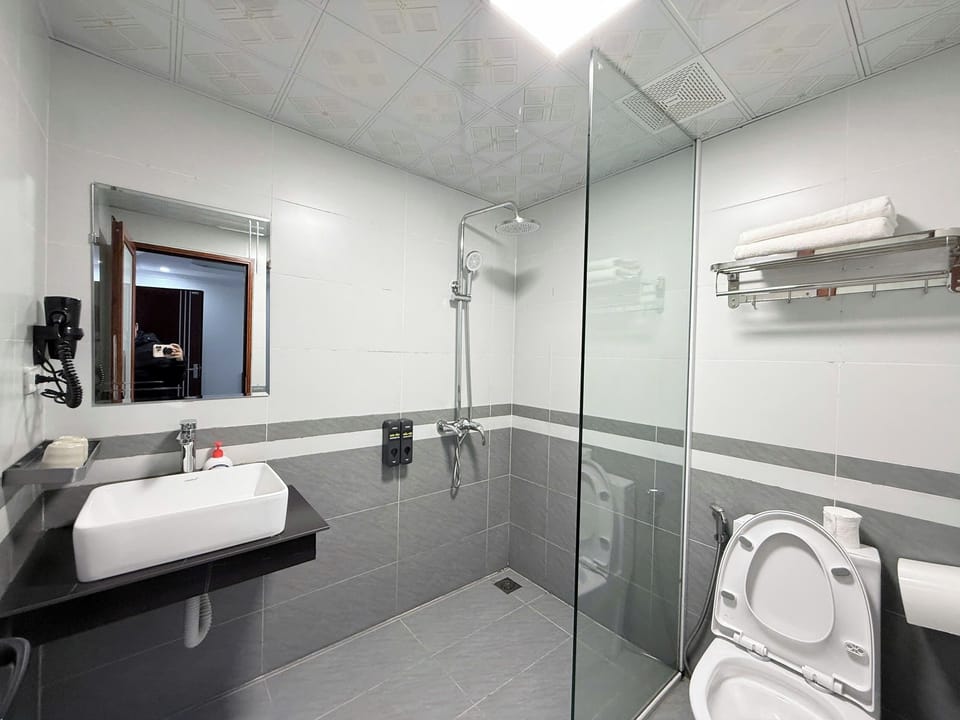 Deluxe Double Room, City View | Bathroom | Shower, hair dryer, towels, soap