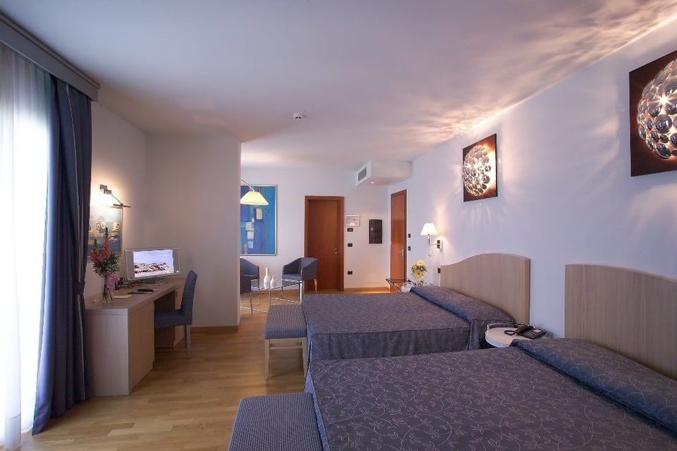 Suite, 2 Queen Beds | Minibar, in-room safe, desk, laptop workspace