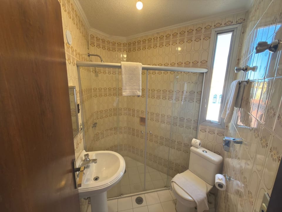 Shower, towels, soap, shampoo