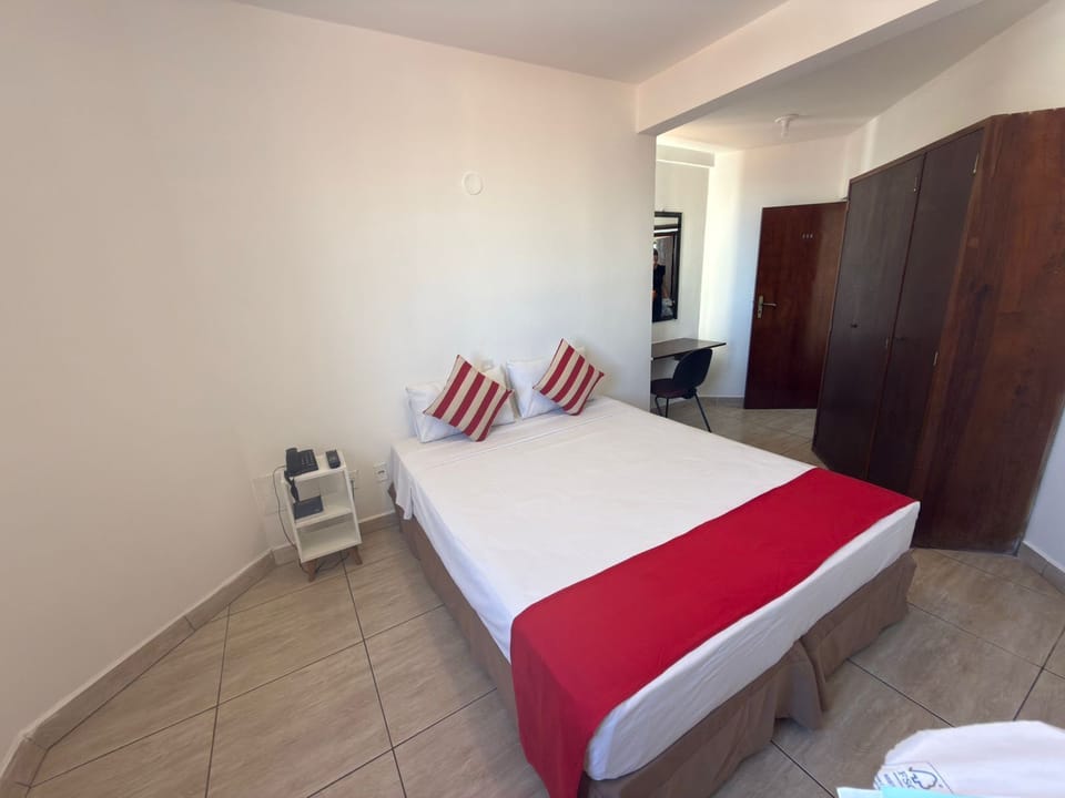 Desk, laptop workspace, free WiFi, bed sheets