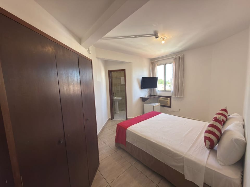 Desk, laptop workspace, free WiFi, bed sheets