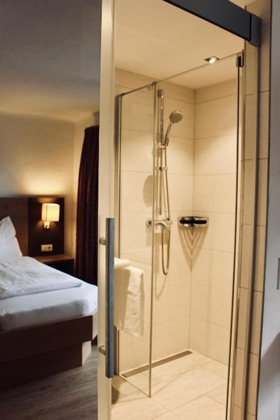 Shower, towels, soap, toilet paper