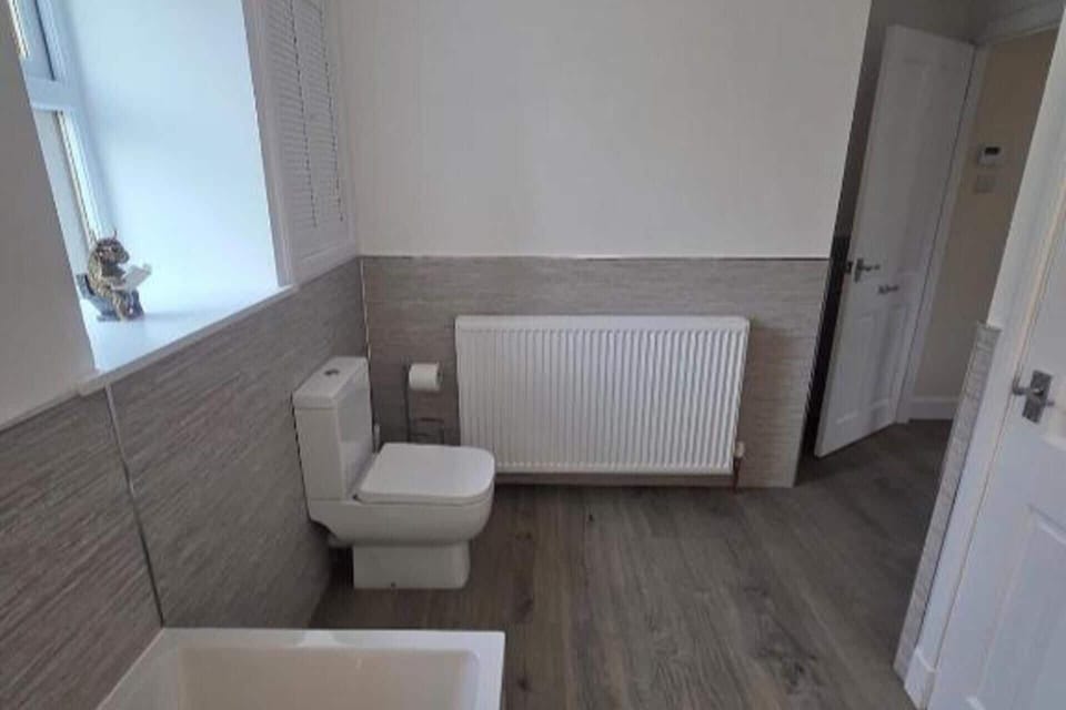 Separate tub and shower, deep soaking tub, hair dryer, towels