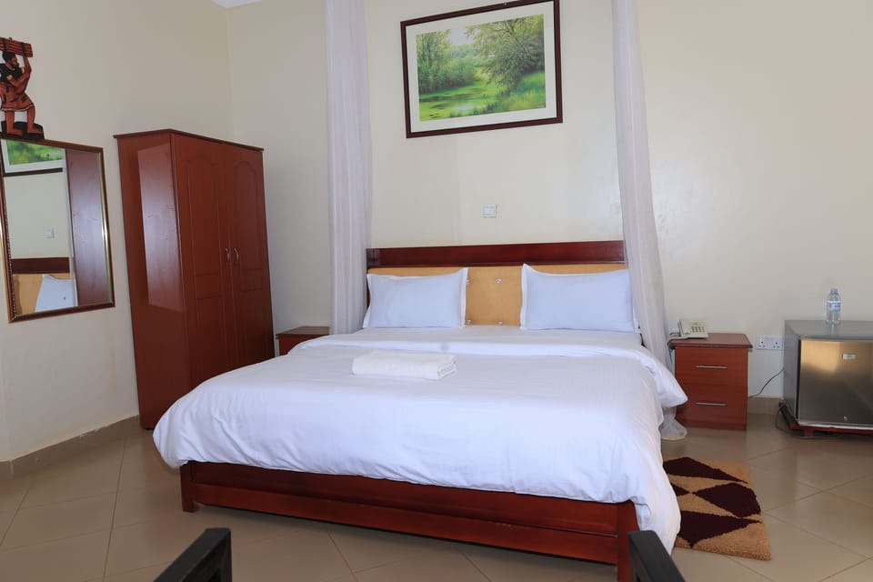 Basic Single Room, Garden View | Blackout drapes, iron/ironing board, free WiFi