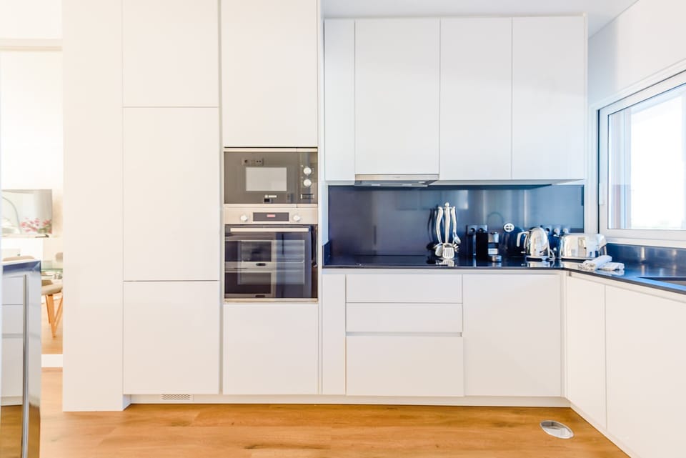Apartment, 2 Bedrooms, Pool Access, Pool View | Private kitchen | Microwave, dishwasher, coffee/tea maker, cookware/dishes/utensils