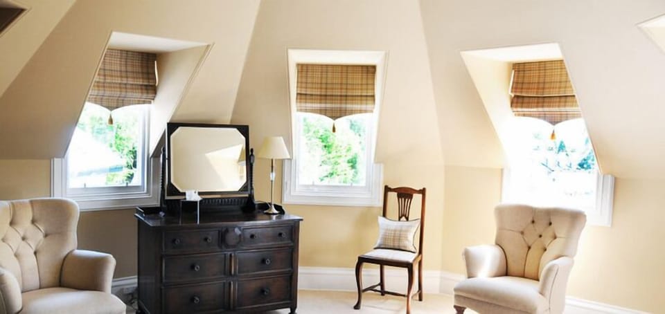 Deluxe Double Room | Living area | Flat-screen TV