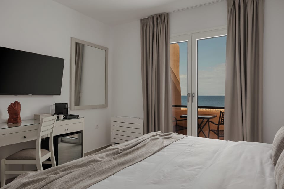 Deluxe Room, Balcony, Sea View | In-room safe, iron/ironing board, free WiFi
