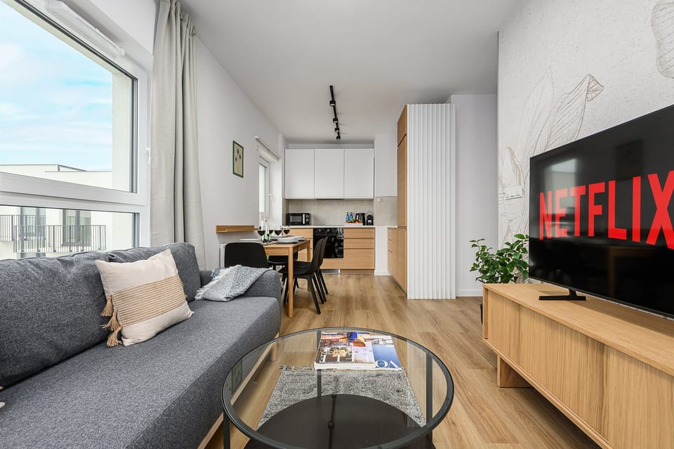 Superior Apartment, Balcony, Courtyard View | Living area | 40-inch flat-screen TV with cable channels