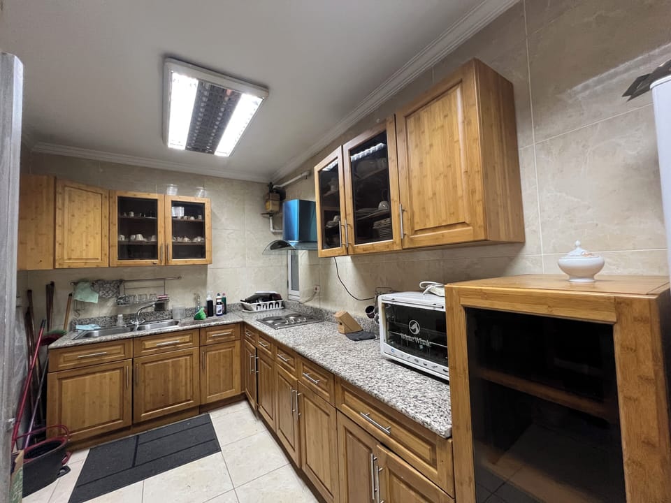 Deluxe Apartment, 3 Bedrooms, Private Bathroom, River View | Private kitchen | Full-size fridge, microwave, oven, stovetop
