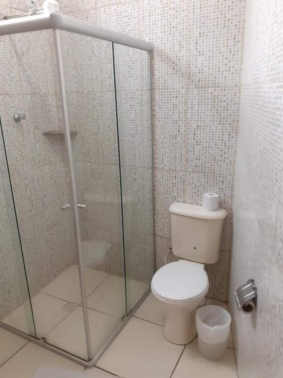Deluxe Quadruple Room, Patio | Bathroom | Shower, free toiletries, hair dryer, towels