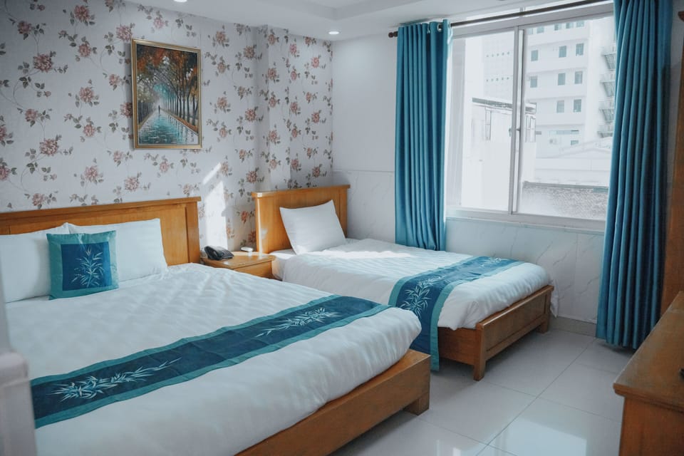 Family Triple Room, 2 Bedrooms, City View | Desk, iron/ironing board, free WiFi
