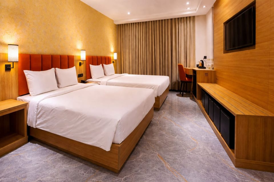 Deluxe Quadruple Room, 2 Queen Beds | In-room safe, WiFi (free)