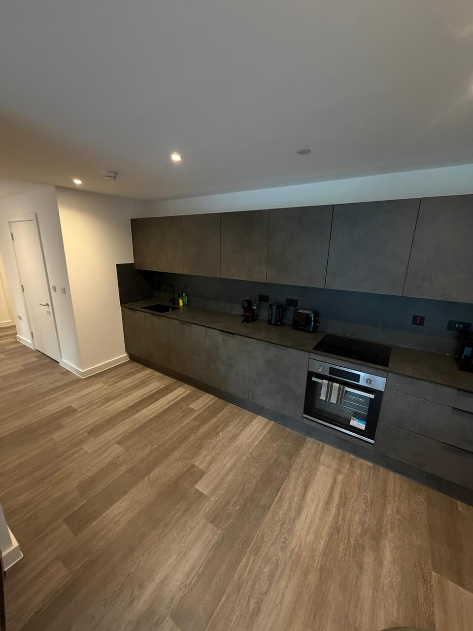 Comfort Apartment | Private kitchen | Full-size fridge, microwave, oven, stovetop