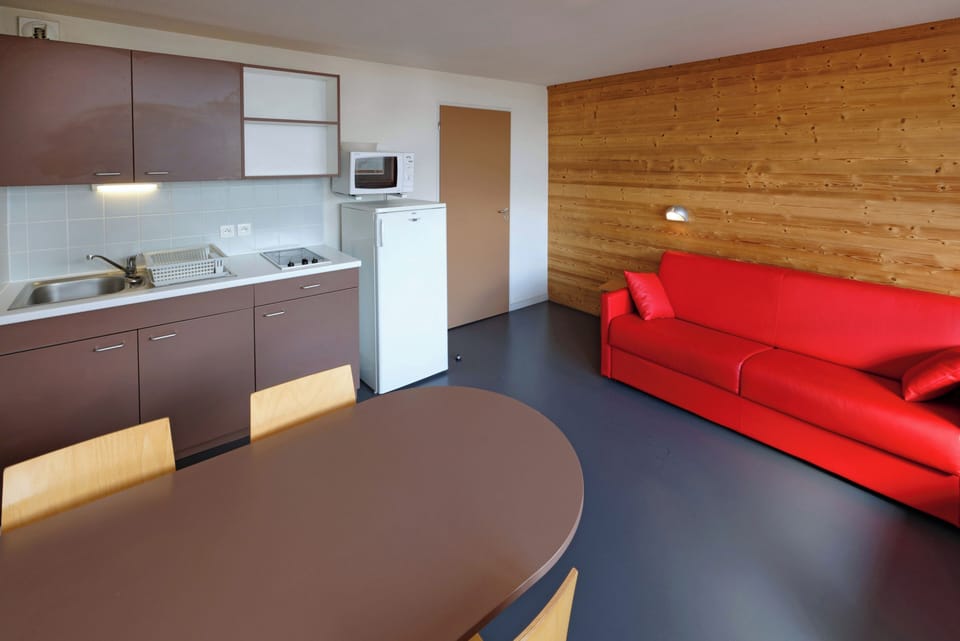 Classic Apartment | Living area | Flat-screen TV