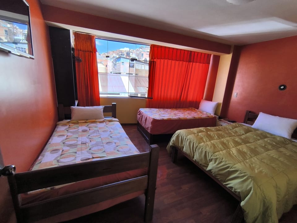 Classic Triple Room, Patio, City View | Desk, laptop workspace, blackout drapes, free WiFi