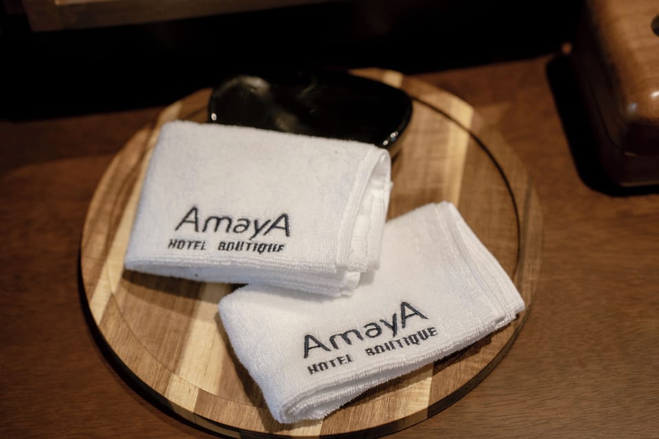 Junior Double Room, Balcony | Bathroom amenities | Slippers, towels, soap, shampoo
