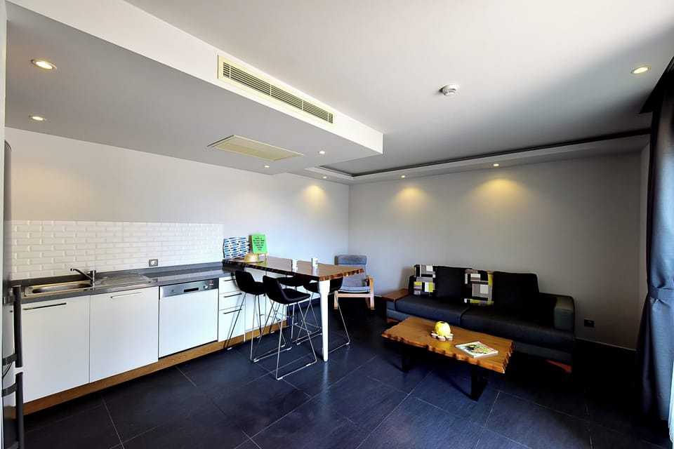 Comfort Apartment | Living area | 39-inch LED TV with satellite channels, TV
