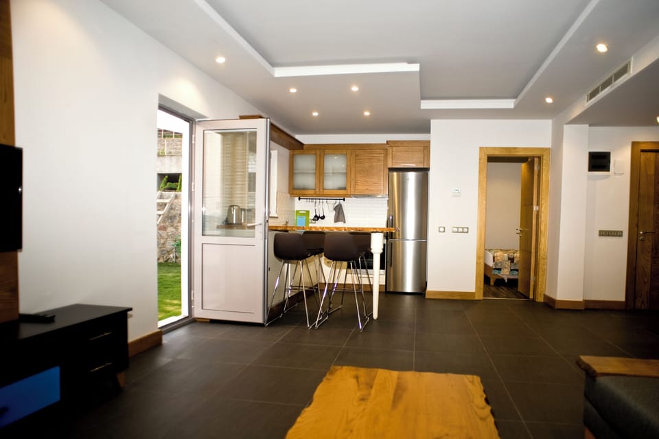 Family Apartment, 2 Bedrooms, Lanai, Sea View | Living area | 39-inch LED TV with satellite channels, TV