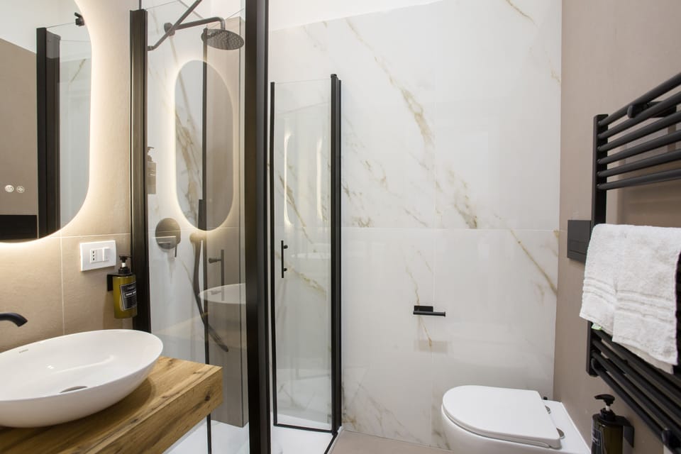 Deluxe Double Room, City View | Bathroom | Shower, hair dryer, towels, soap