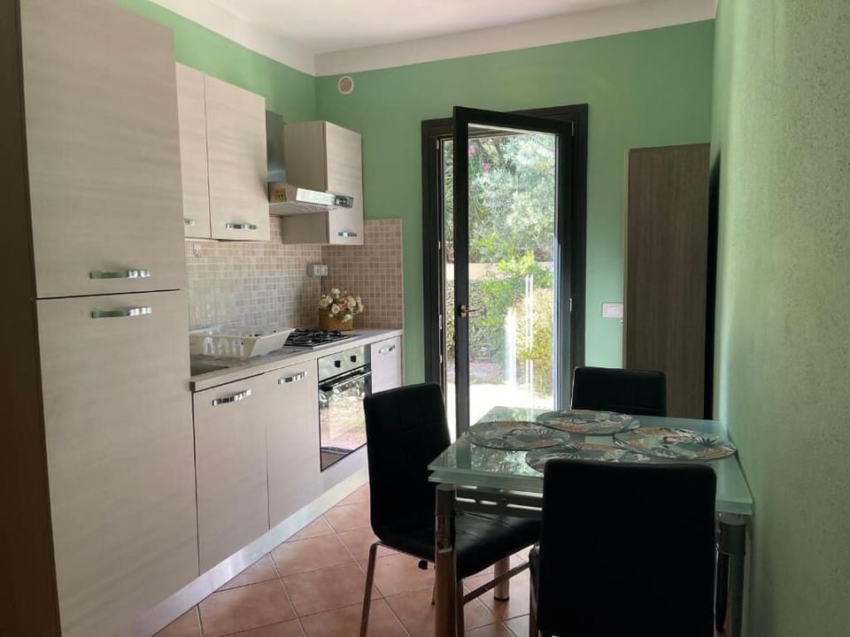 Family Cottage, Resort View | Private kitchen | Fridge, oven, stovetop, highchair