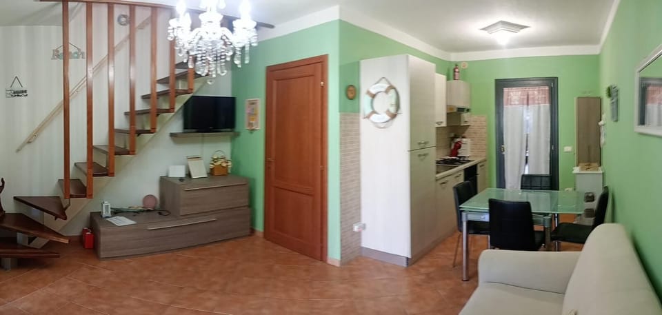 Family Cottage, Resort View | Living area | Flat-screen TV