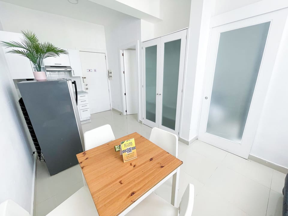 Exclusive Studio, Pool Access, City View | Living area | 32-inch LCD TV with cable channels