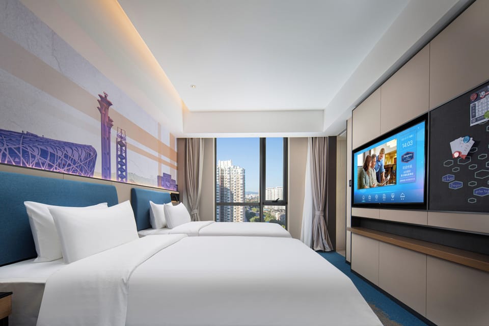 Classic Double or Twin Room, City View | Desk, laptop workspace, blackout drapes, iron/ironing board (on request)