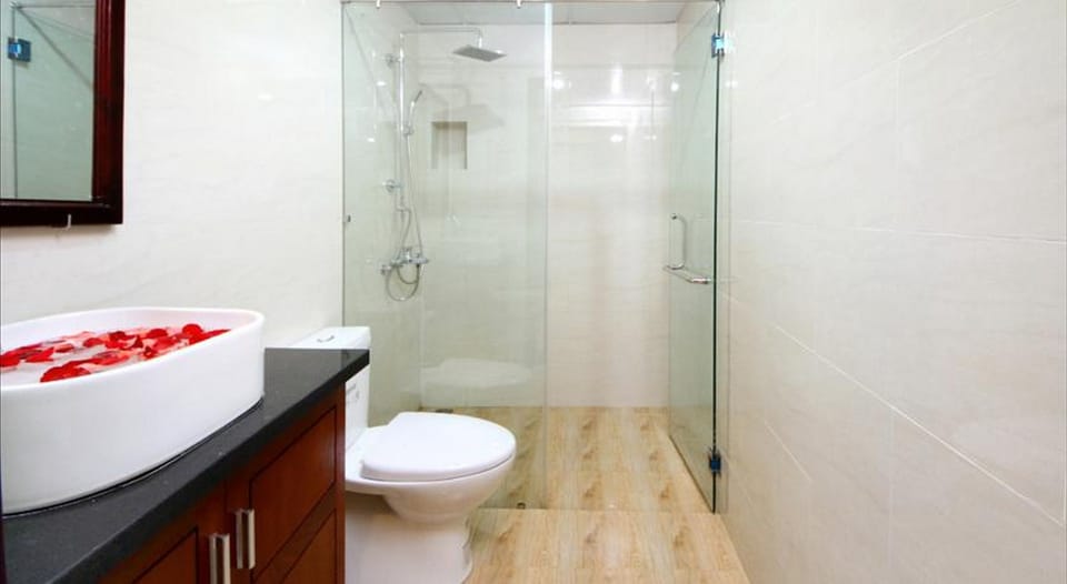 Shower, free toiletries, hair dryer, slippers