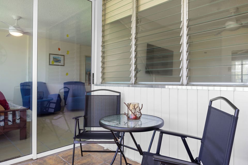 Apartment, Balcony, Pool View | Living area | 32-inch flat-screen TV with digital channels