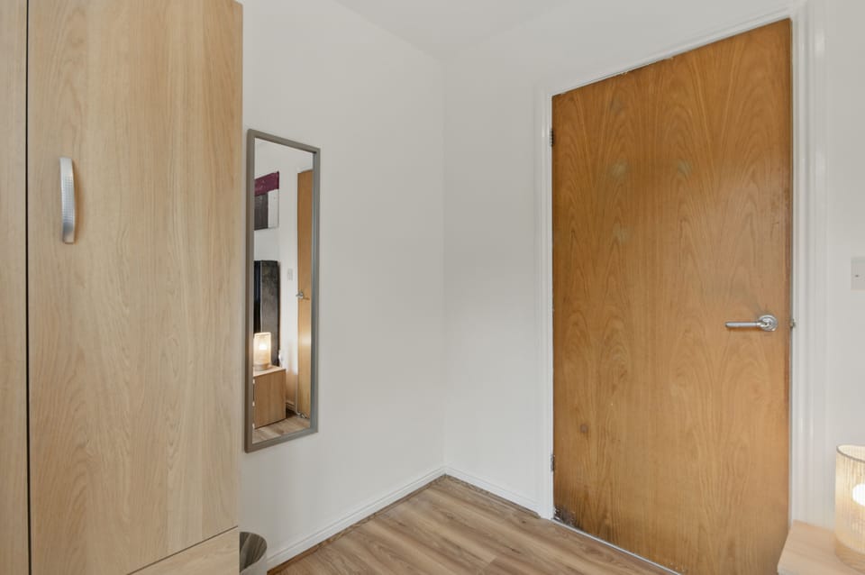 Comfort Apartment | Living area | 50-inch Smart TV with digital channels, Netflix, streaming services