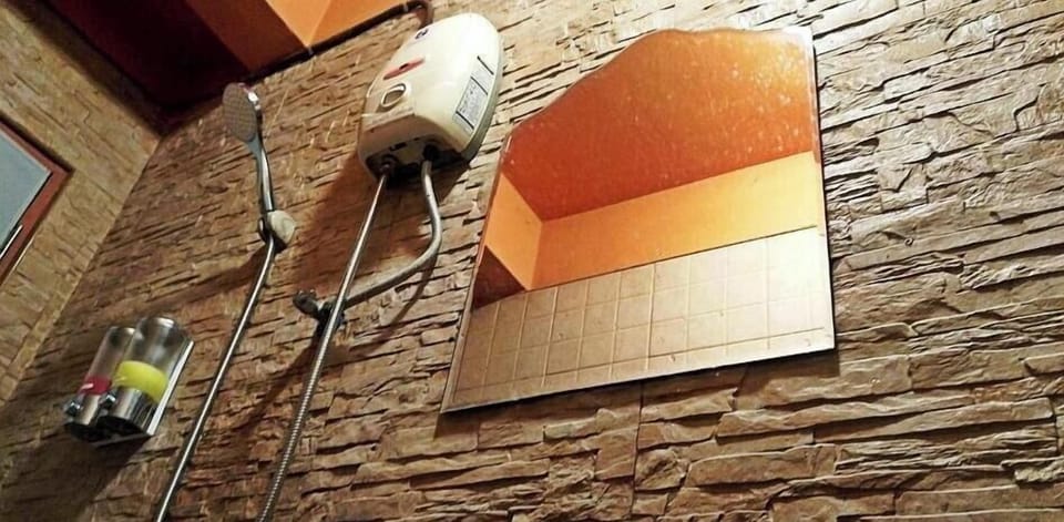 Basic Studio, Balcony, City View | Bathroom | Shower, free toiletries, hair dryer, slippers